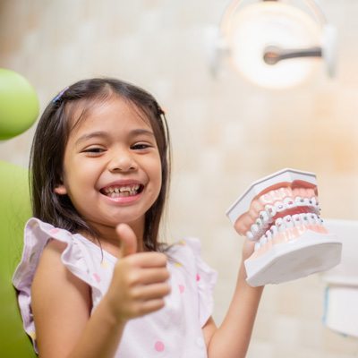 Little Asian girls teeth are healthy in the Dental office