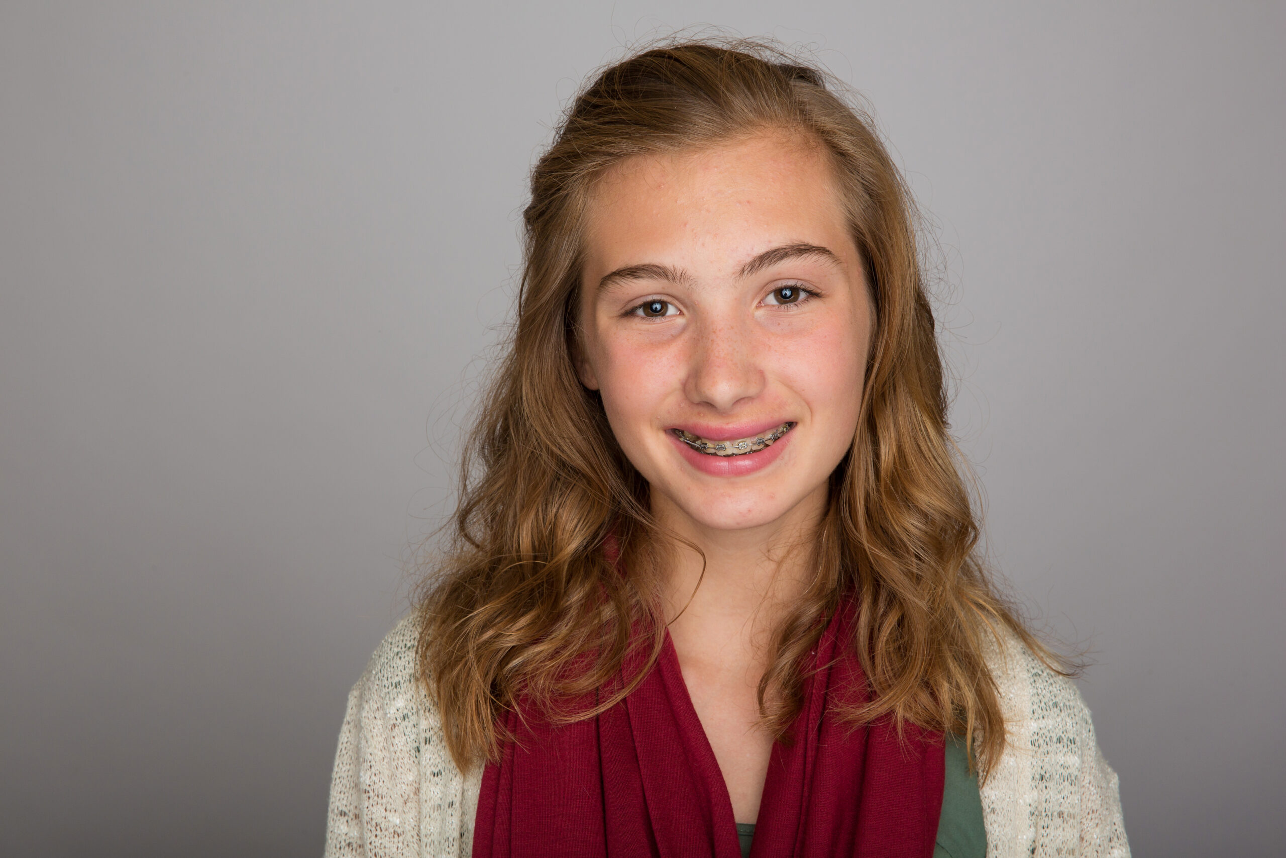 Happy teen with braces Airways and Orthodontics
